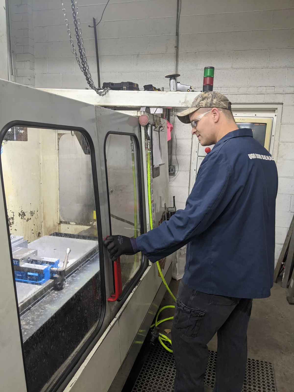 An Allred operator working on a stamping die