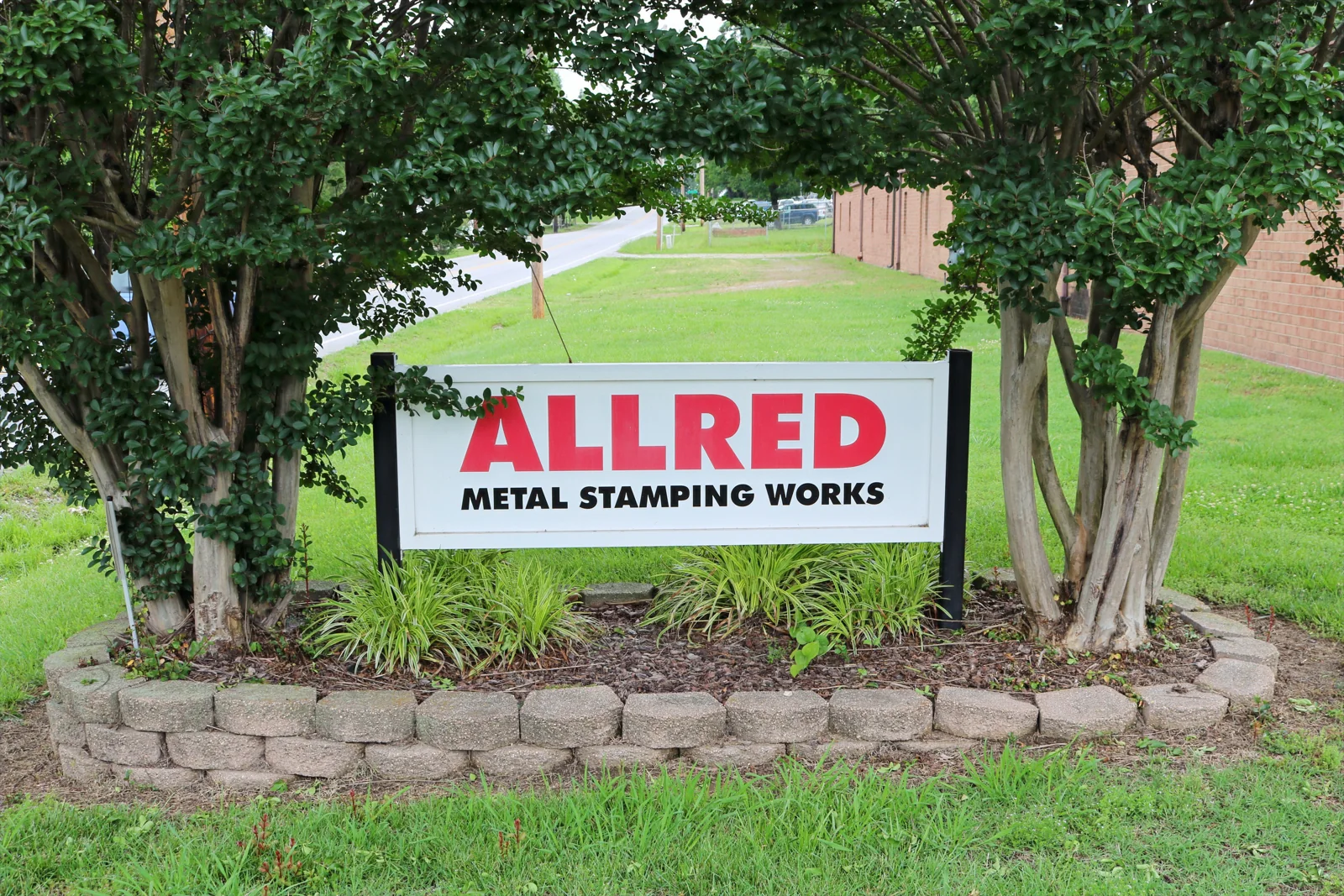 The Allred Metal Stamping Works entrance sign in High Point